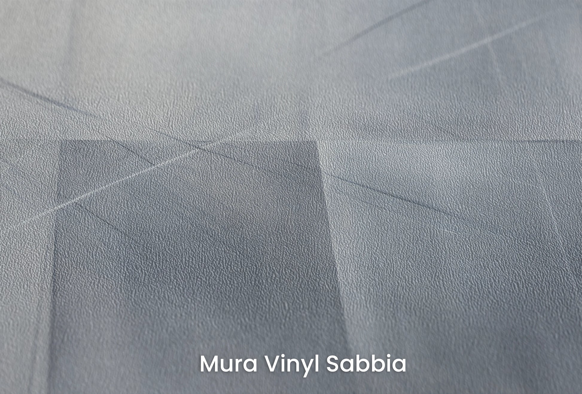 Zbliżenie na artystyczną fototapetę o nazwie Urban Scape na podłożu Mura Vinyl Sabbia struktura grubego ziarna piasku.
