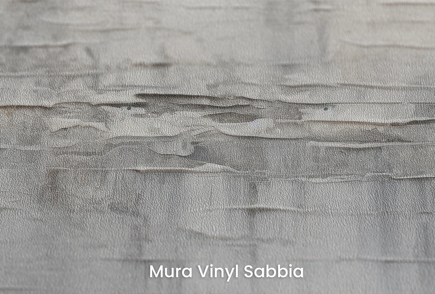 Zbliżenie na artystyczną fototapetę o nazwie Pallid Canvas na podłożu Mura Vinyl Sabbia struktura grubego ziarna piasku.