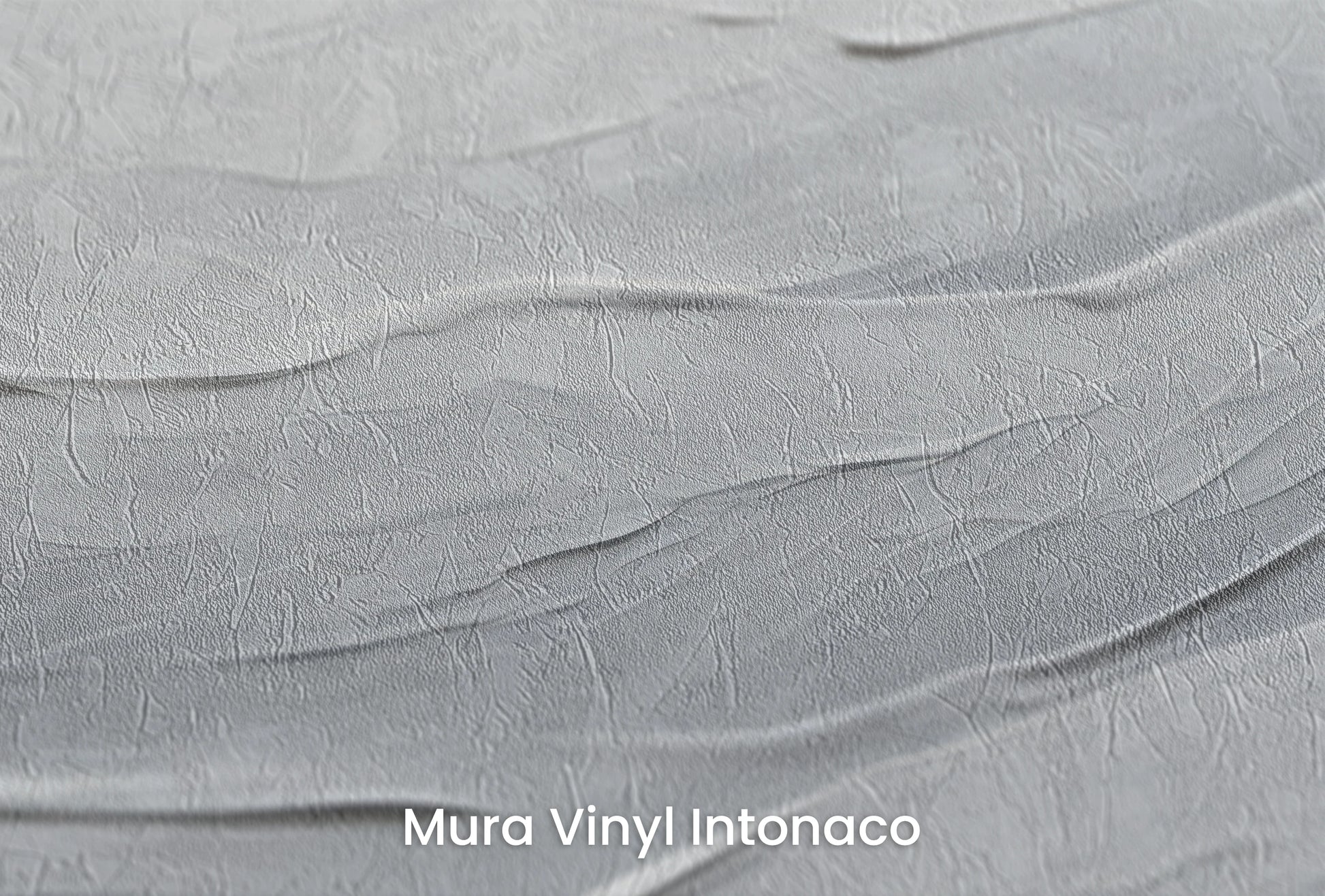 Zbliżenie na artystyczną fototapetę o nazwie Silent Waves na podłożu Mura Vinyl Intonaco - struktura tartego tynku.
