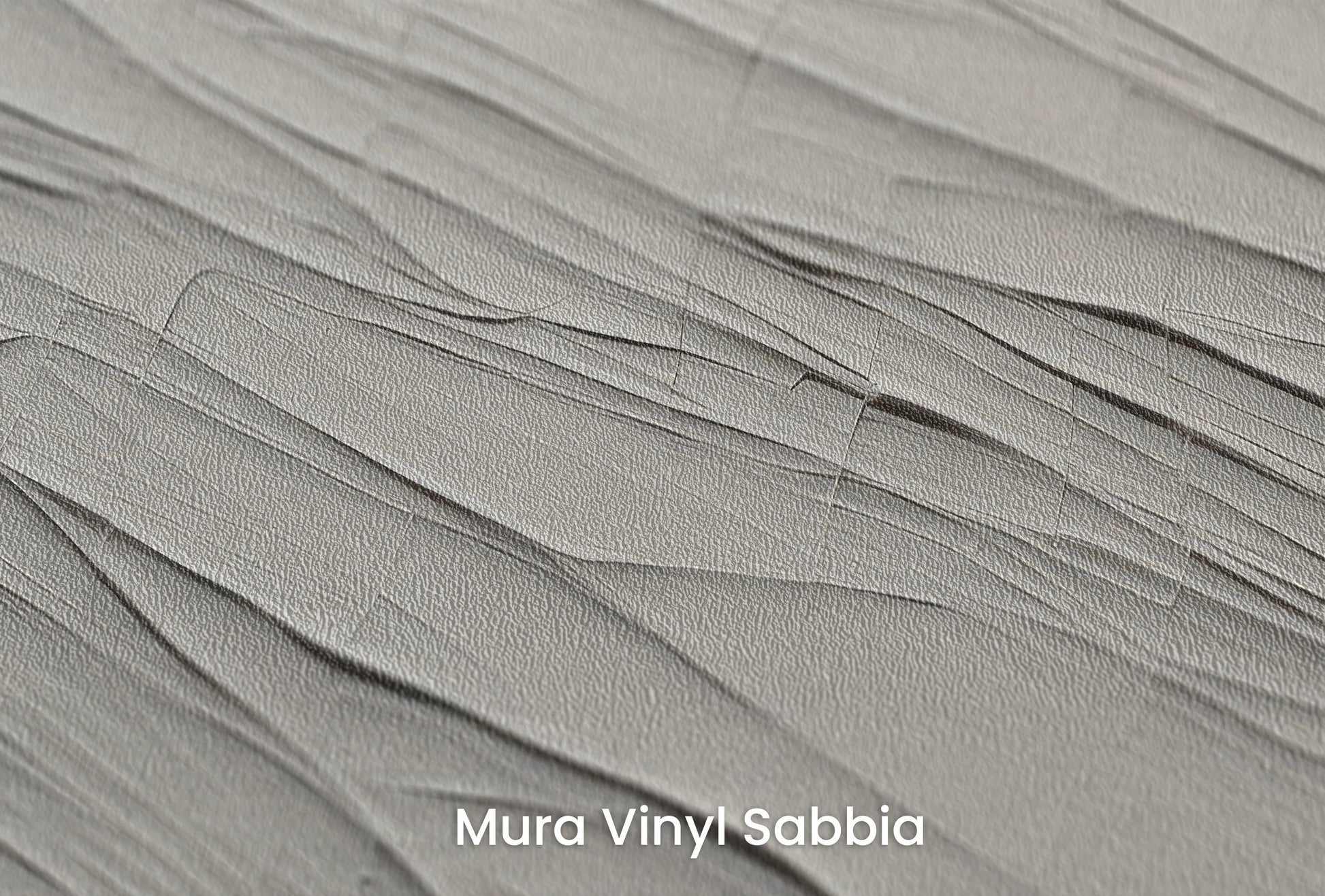 Zbliżenie na artystyczną fototapetę o nazwie Subtle Dynamics na podłożu Mura Vinyl Sabbia struktura grubego ziarna piasku.