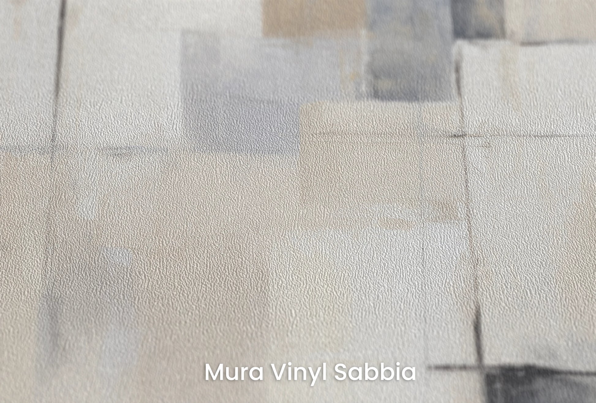 Zbliżenie na artystyczną fototapetę o nazwie Soft Intersection na podłożu Mura Vinyl Sabbia struktura grubego ziarna piasku.
