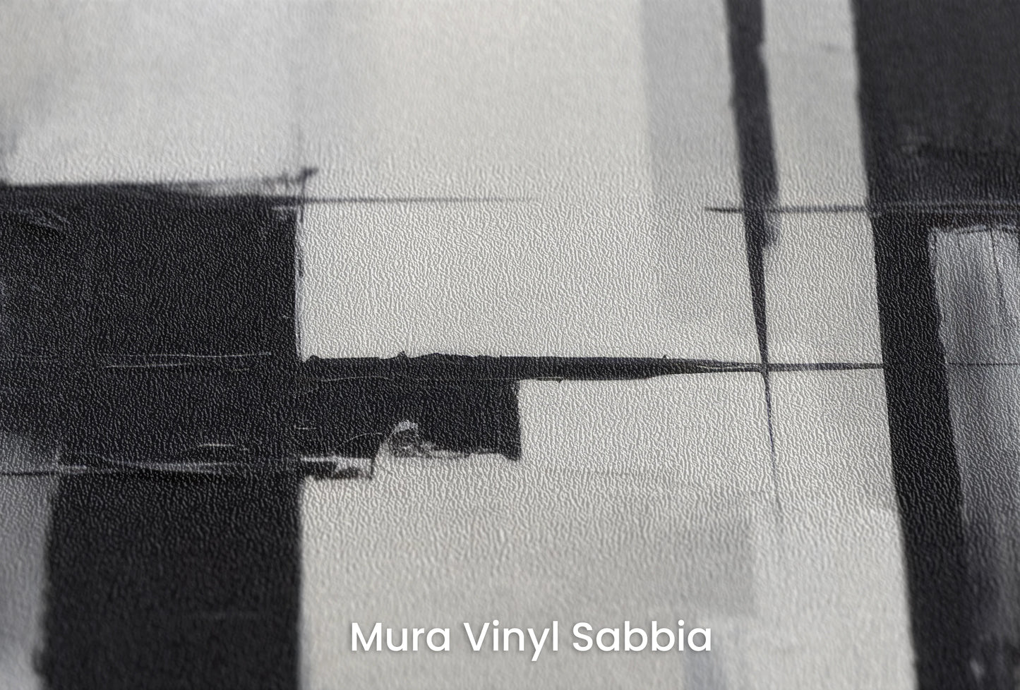 Zbliżenie na artystyczną fototapetę o nazwie Monochrome Reflection na podłożu Mura Vinyl Sabbia struktura grubego ziarna piasku.
