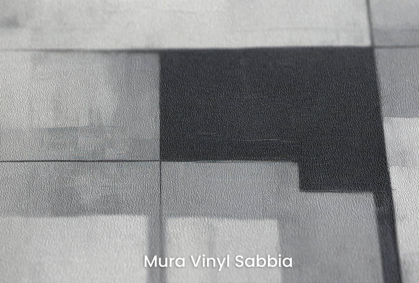 Zbliżenie na artystyczną fototapetę o nazwie Monochromatic Elegance #2 na podłożu Mura Vinyl Sabbia struktura grubego ziarna piasku.