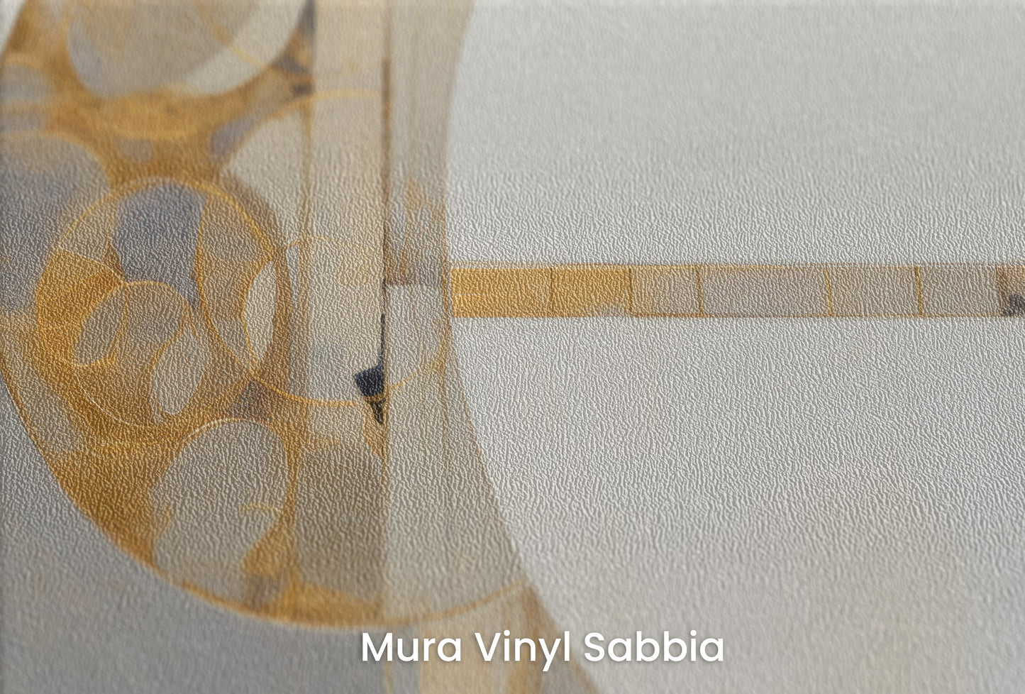 Zbliżenie na artystyczną fototapetę o nazwie AUREATE CIRCLE HARMONY na podłożu Mura Vinyl Sabbia struktura grubego ziarna piasku.