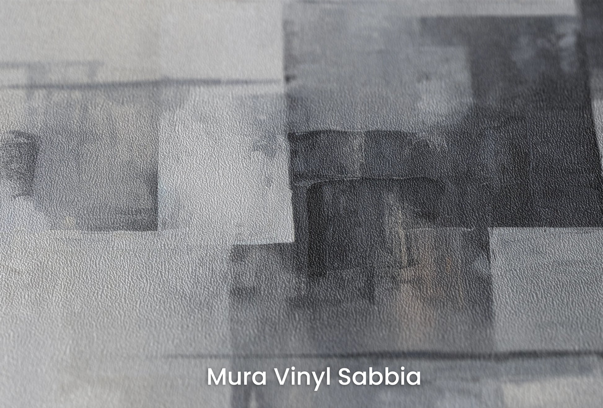 Zbliżenie na artystyczną fototapetę o nazwie Shades and Tones na podłożu Mura Vinyl Sabbia struktura grubego ziarna piasku.