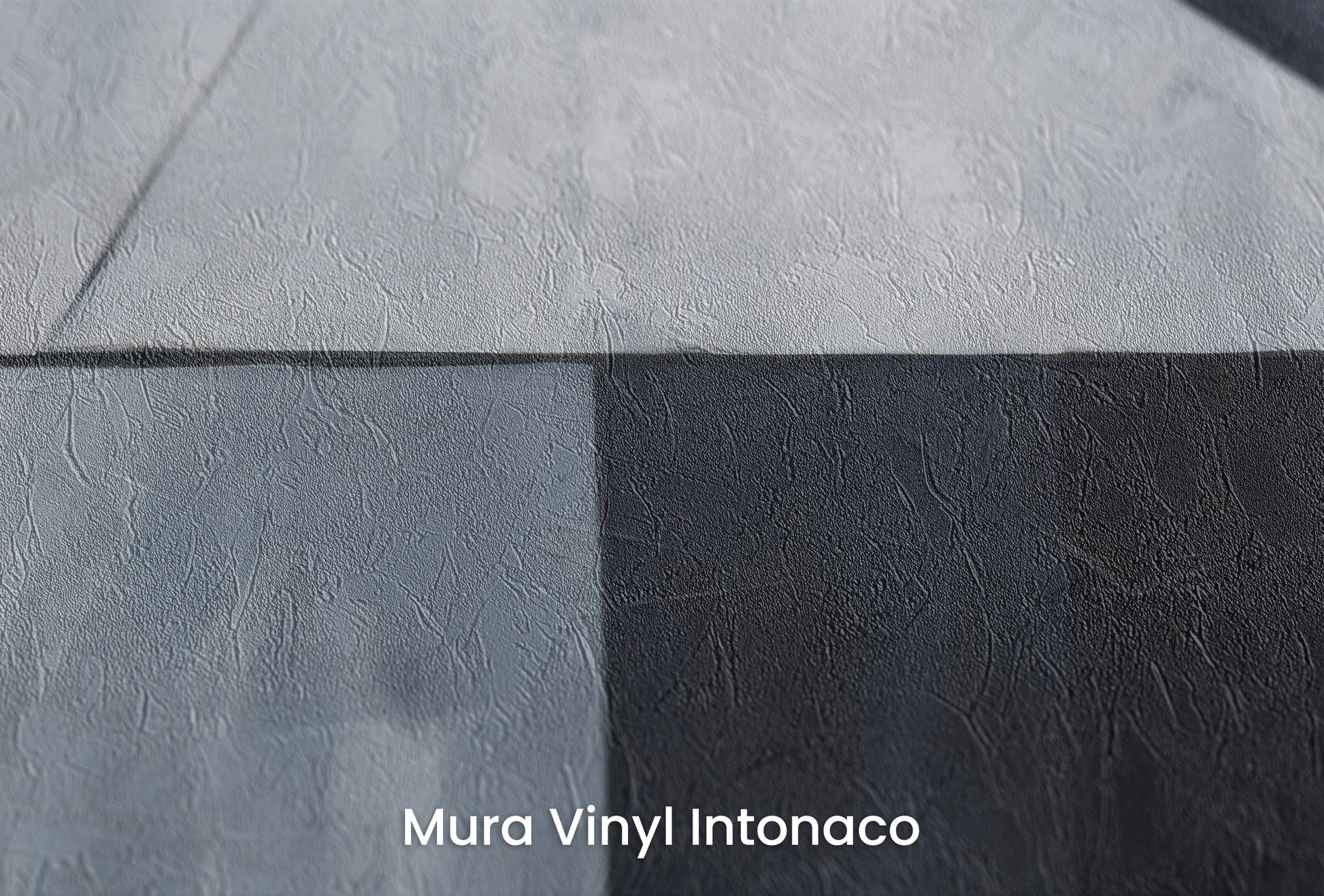 Zbliżenie na artystyczną fototapetę o nazwie Sharp Edges na podłożu Mura Vinyl Intonaco - struktura tartego tynku.