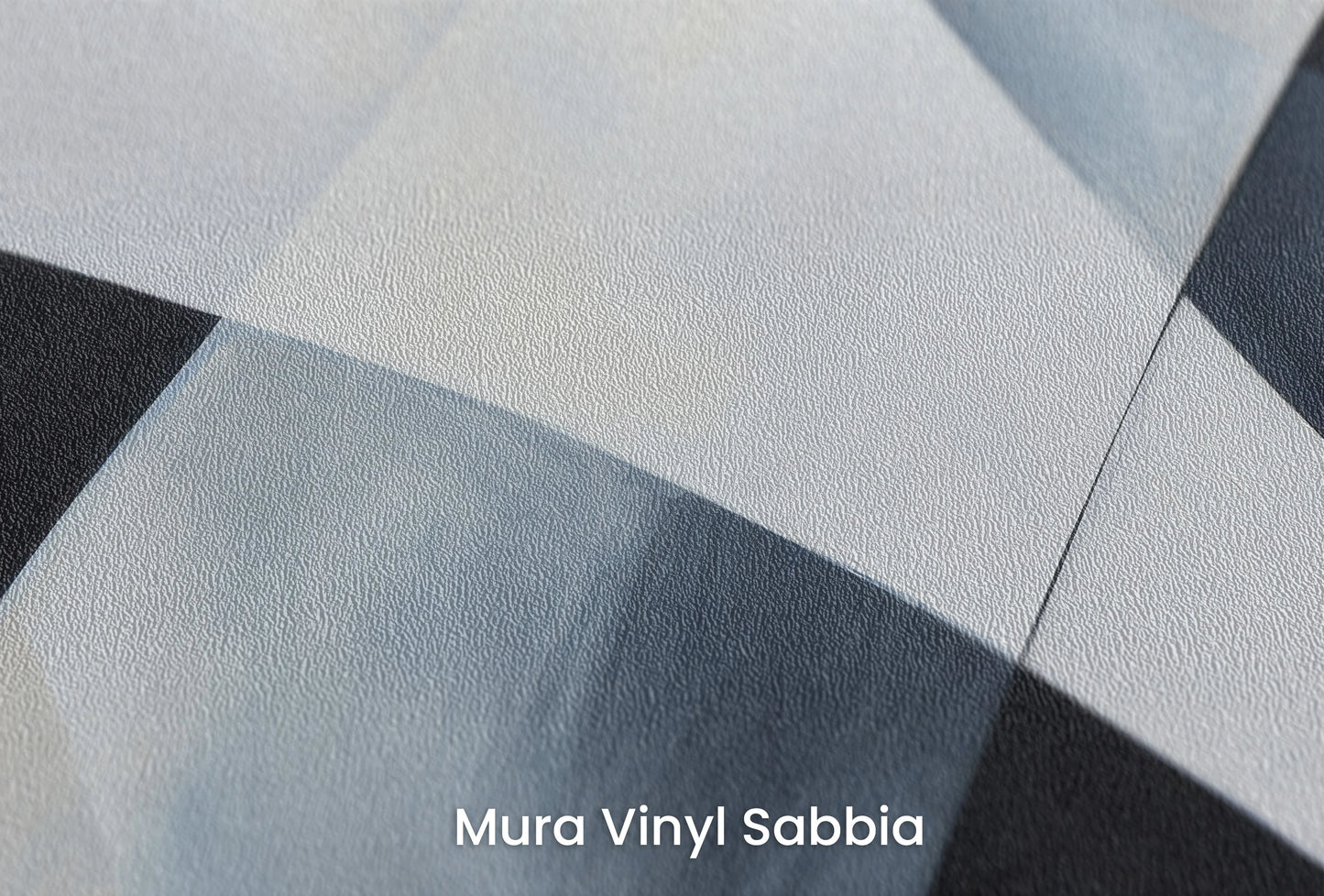 Zbliżenie na artystyczną fototapetę o nazwie Shades of Geometry na podłożu Mura Vinyl Sabbia struktura grubego ziarna piasku.
