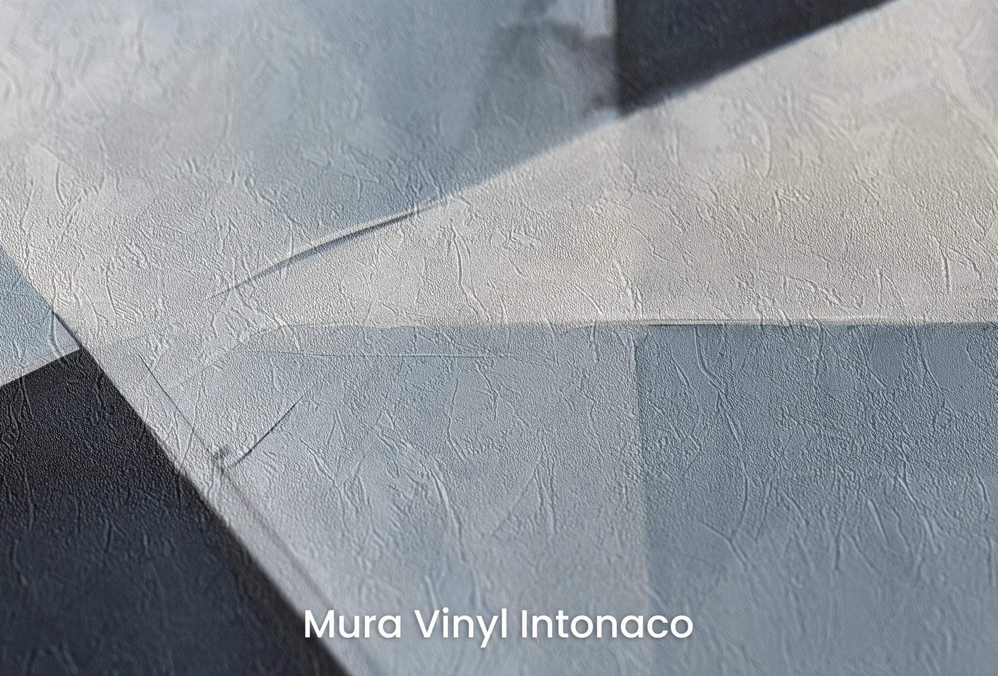 Zbliżenie na artystyczną fototapetę o nazwie Geometric Harmony na podłożu Mura Vinyl Intonaco - struktura tartego tynku.