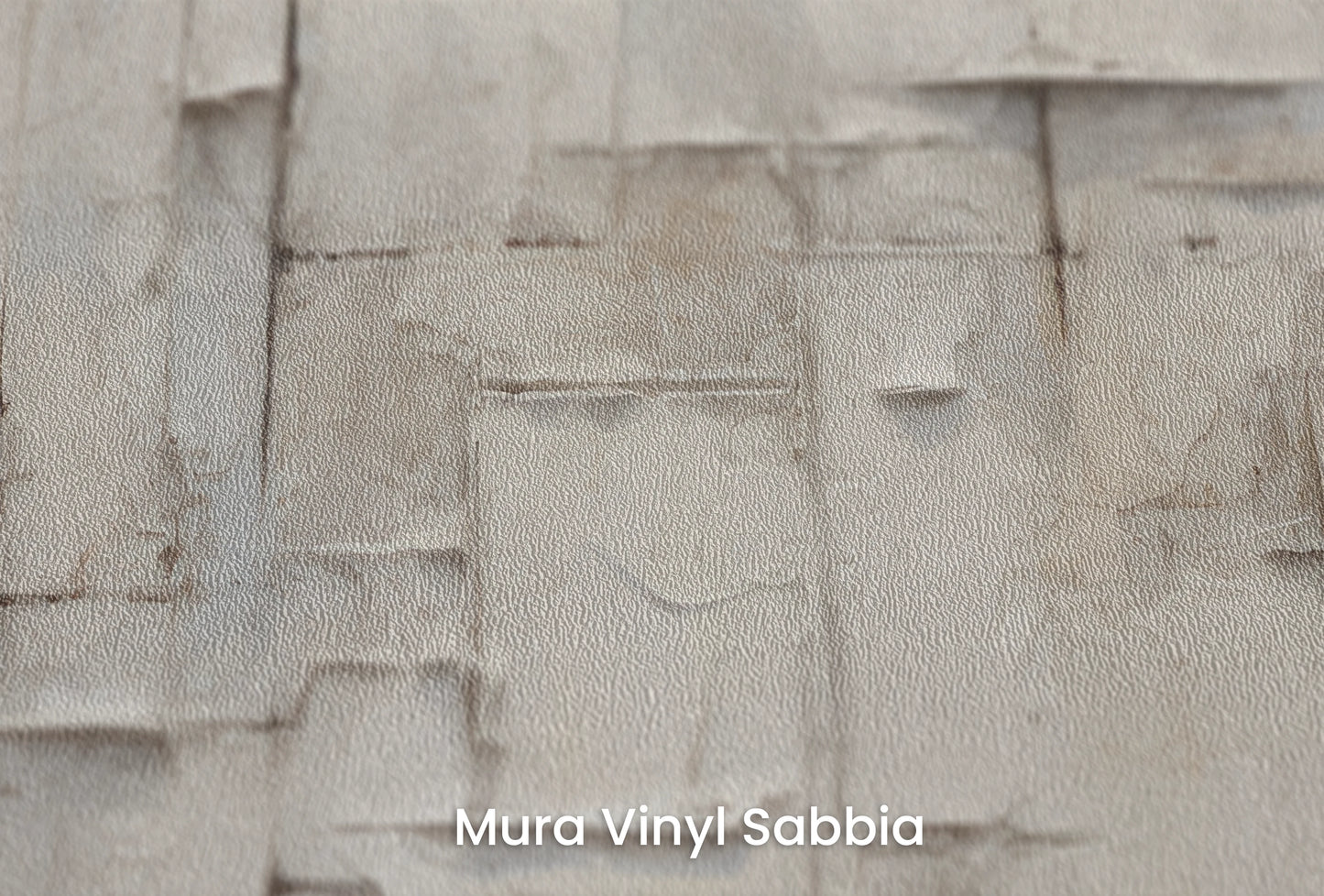 Zbliżenie na artystyczną fototapetę o nazwie Ivory Patchwork na podłożu Mura Vinyl Sabbia struktura grubego ziarna piasku.