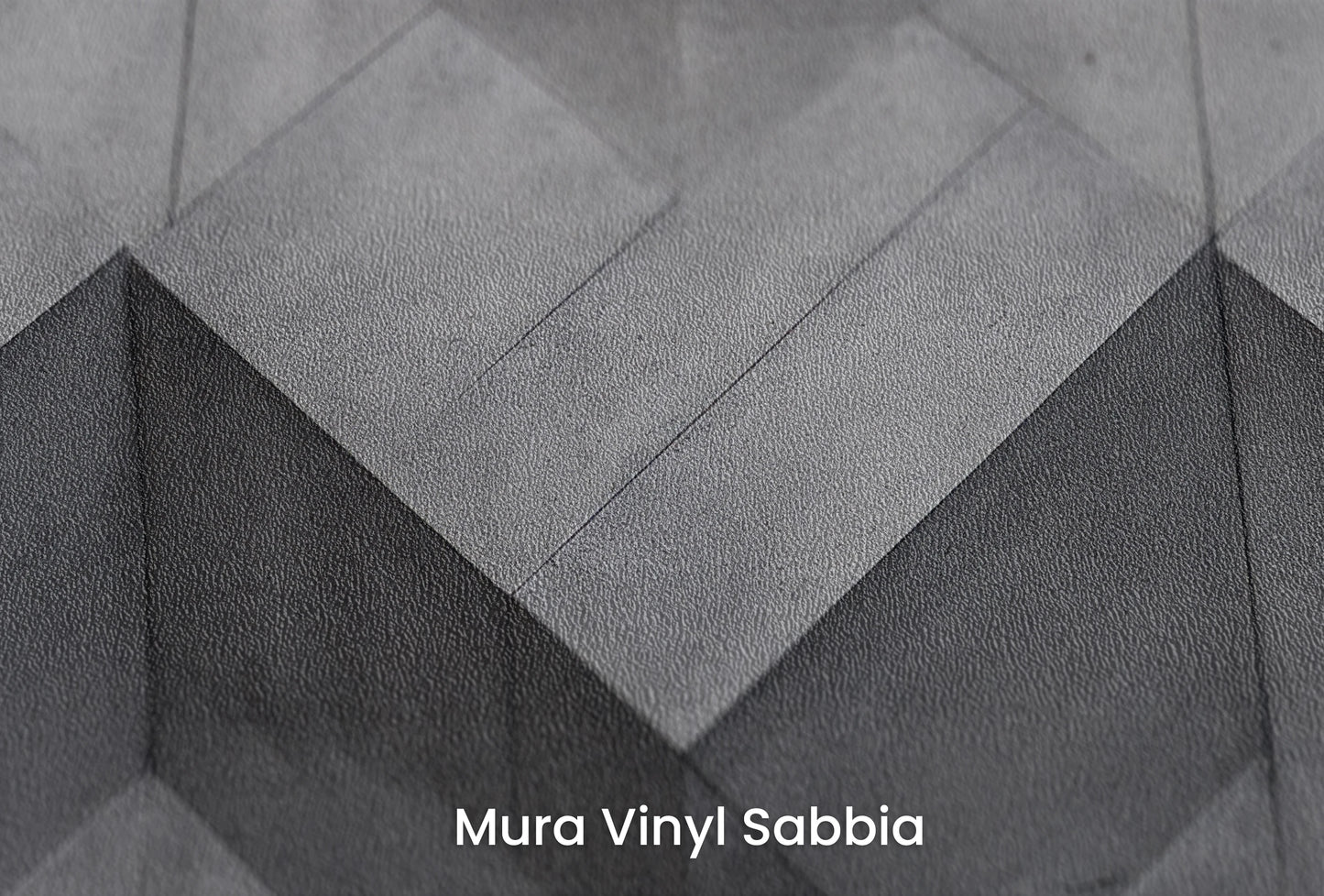 Zbliżenie na artystyczną fototapetę o nazwie Zigzag Concrete na podłożu Mura Vinyl Sabbia struktura grubego ziarna piasku.
