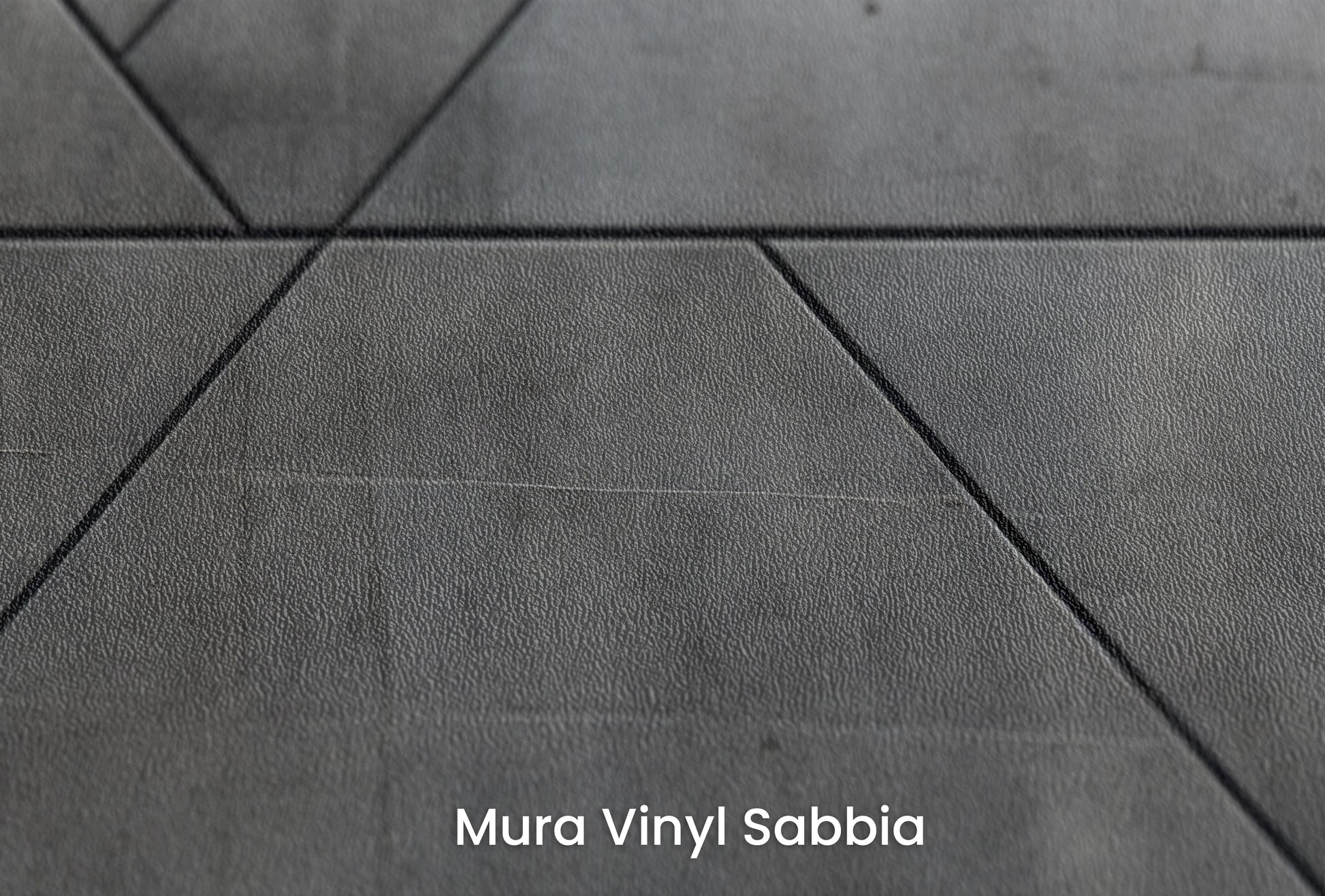 Zbliżenie na artystyczną fototapetę o nazwie Linear Intersection na podłożu Mura Vinyl Sabbia struktura grubego ziarna piasku.
