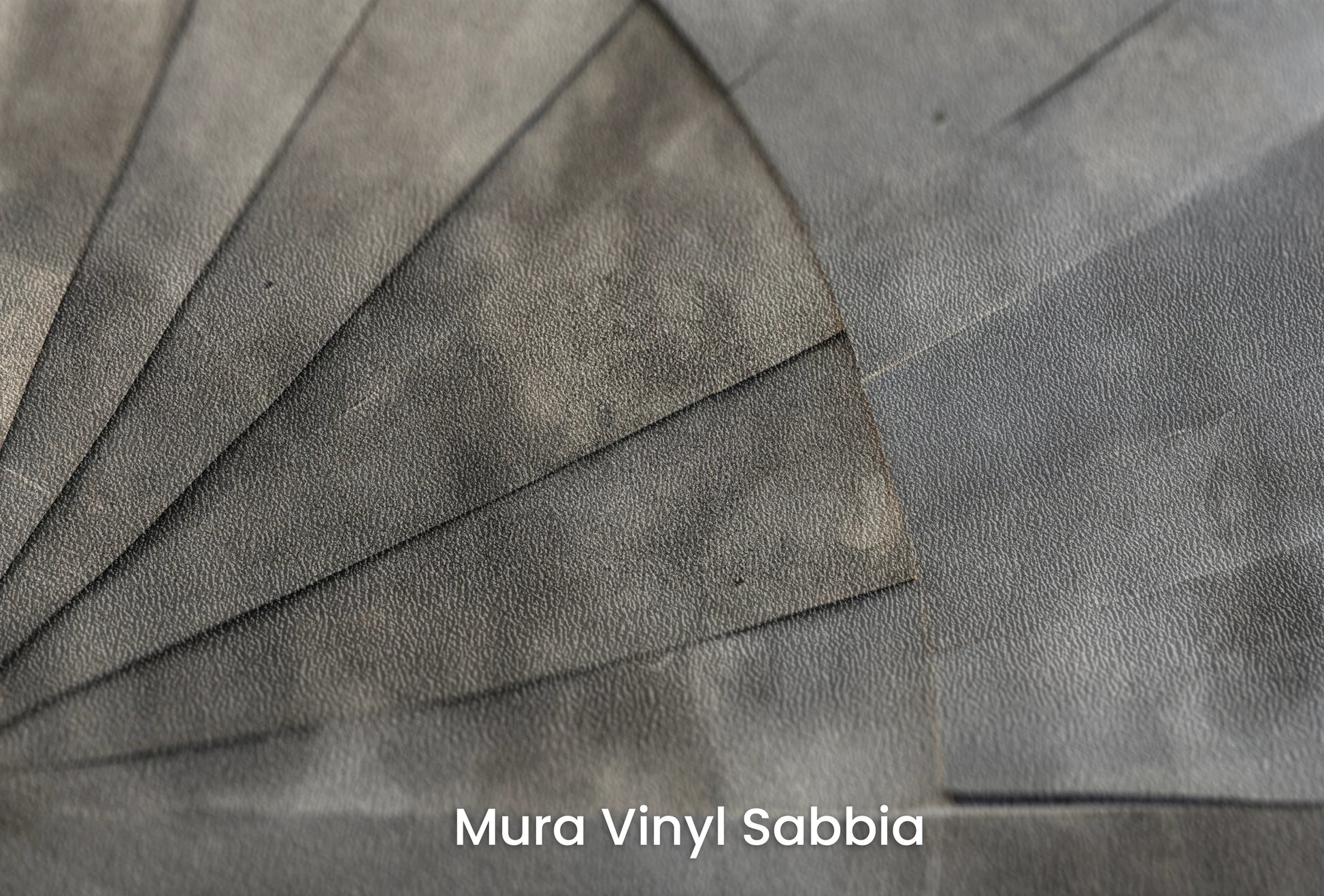 Zbliżenie na artystyczną fototapetę o nazwie Sunray Stone na podłożu Mura Vinyl Sabbia struktura grubego ziarna piasku.